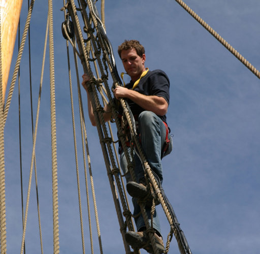 Dan Snow climbing the rigging on a reconstruction of a Tudor ship.